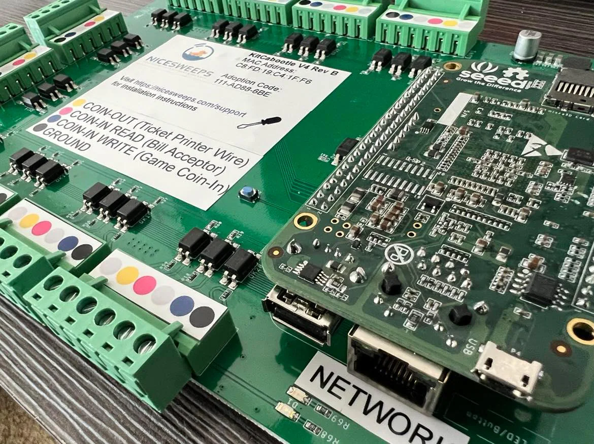 KitCabootle board label with the wiring color code and network port